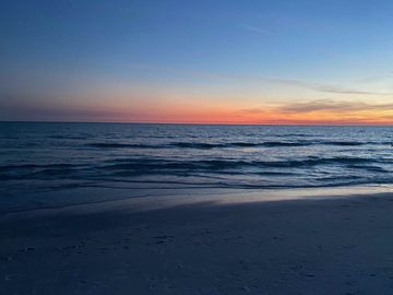 The beach at sunset.